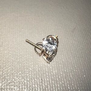 New 14k solid yellow gold Studs with lab created diamond. About 2ct
